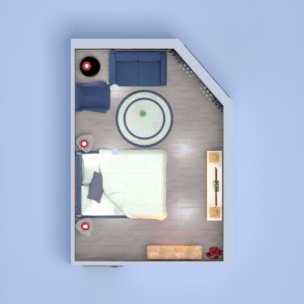 A small bedroom with sitting area