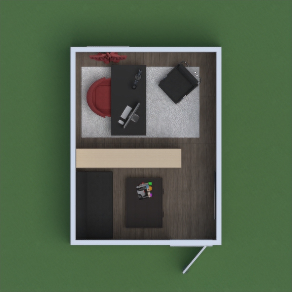 This is office with red chair, black desk, computer, and lamp, and there is a book shelf