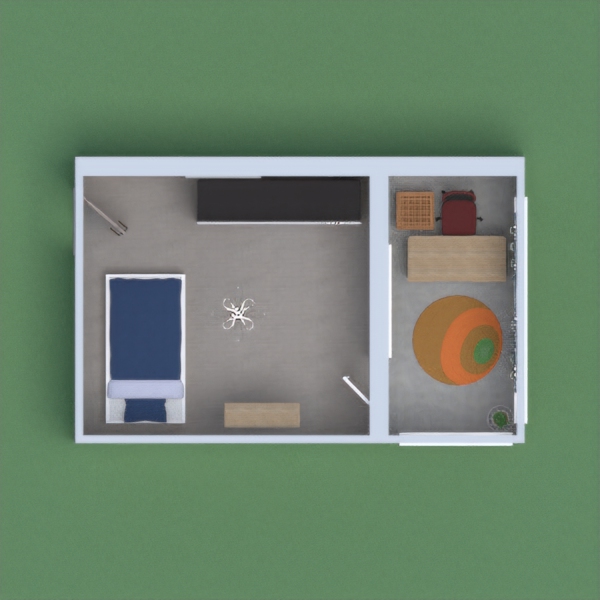A single-person bedroom with an office